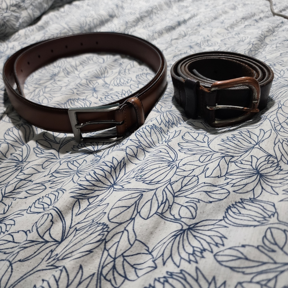 Two Belts Available One Is The Perry Ellis Size 40 And The Other Is A Medium